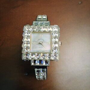 Watch. New without tags or box, needs a battery.